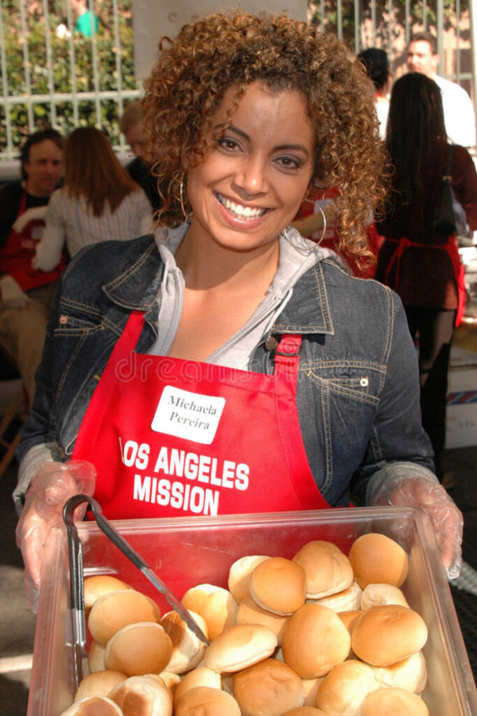Michaela volunteering serving at the Los Angeles Mission
